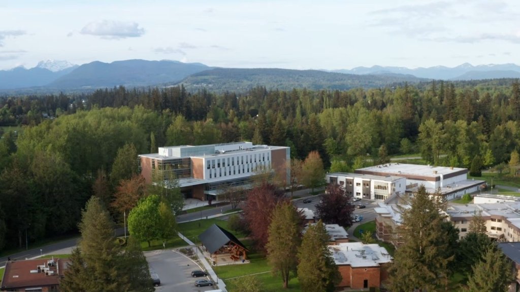 Trinity Western University campus in Langley BC with distant green landscape