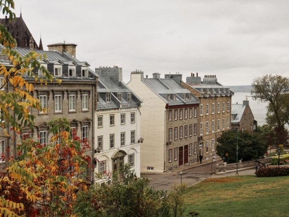 a view of historic buildings in Old Quebec City during fall